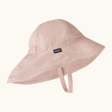 Patagonia little kids recycled nylon sun block hat in pale pink. Features a wide neck protector panel and chin strap
