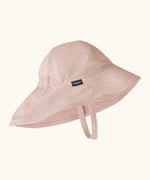 Patagonia little kids recycled nylon sun block hat in pale pink. Features a wide neck protector panel and chin strap
