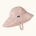 Patagonia little kids recycled nylon sun block hat in pale pink. Features a wide neck protector panel and chin strap