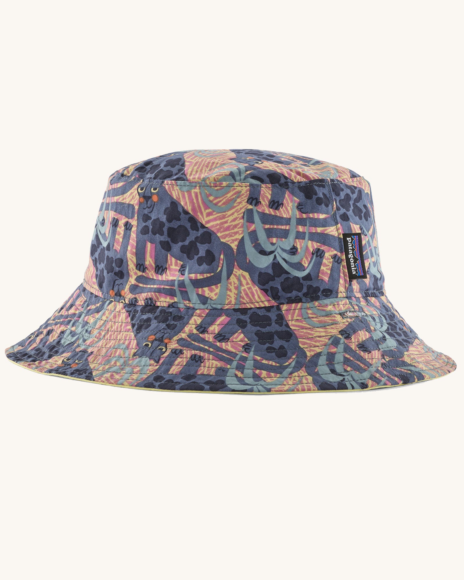 Patagonia reversible baby sun bucket hat shown with all over jaggy style faded magenta print.