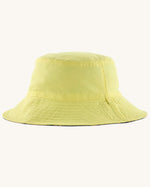 Patagonia reversible baby sun bucket hat shown on the plain light lime green side.