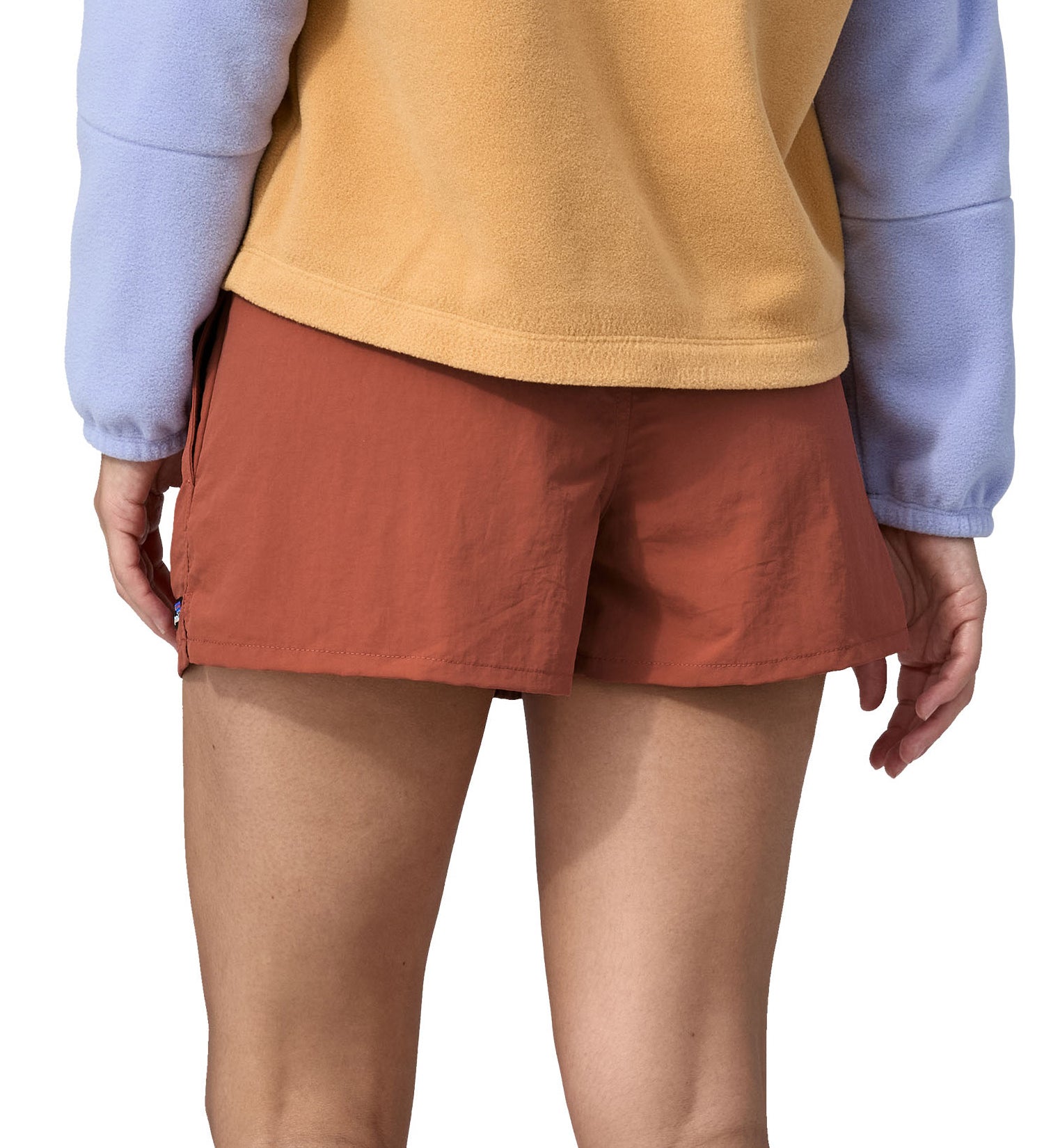 Patagonia women's barely baggies shorts in brown worn by a woman back detail