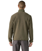 Back of a man wearing the Patagonia Men's Synchilla® Fleece Jacket in Basin Green, a solid khaki green full zip fleece jacket. Made from Synchilla® 100% recycled fleece. 