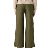 Rear view of the Patagonia women's basin green canvas trousers. Showing the wide leg fit and 2 back pockets