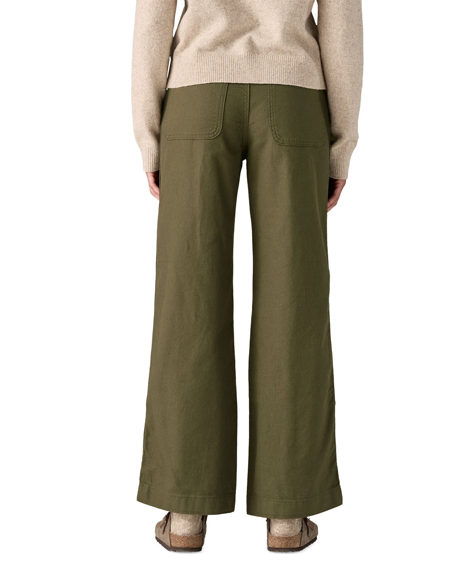 Rear view of the Patagonia women's basin green canvas trousers. Showing the wide leg fit and 2 back pockets