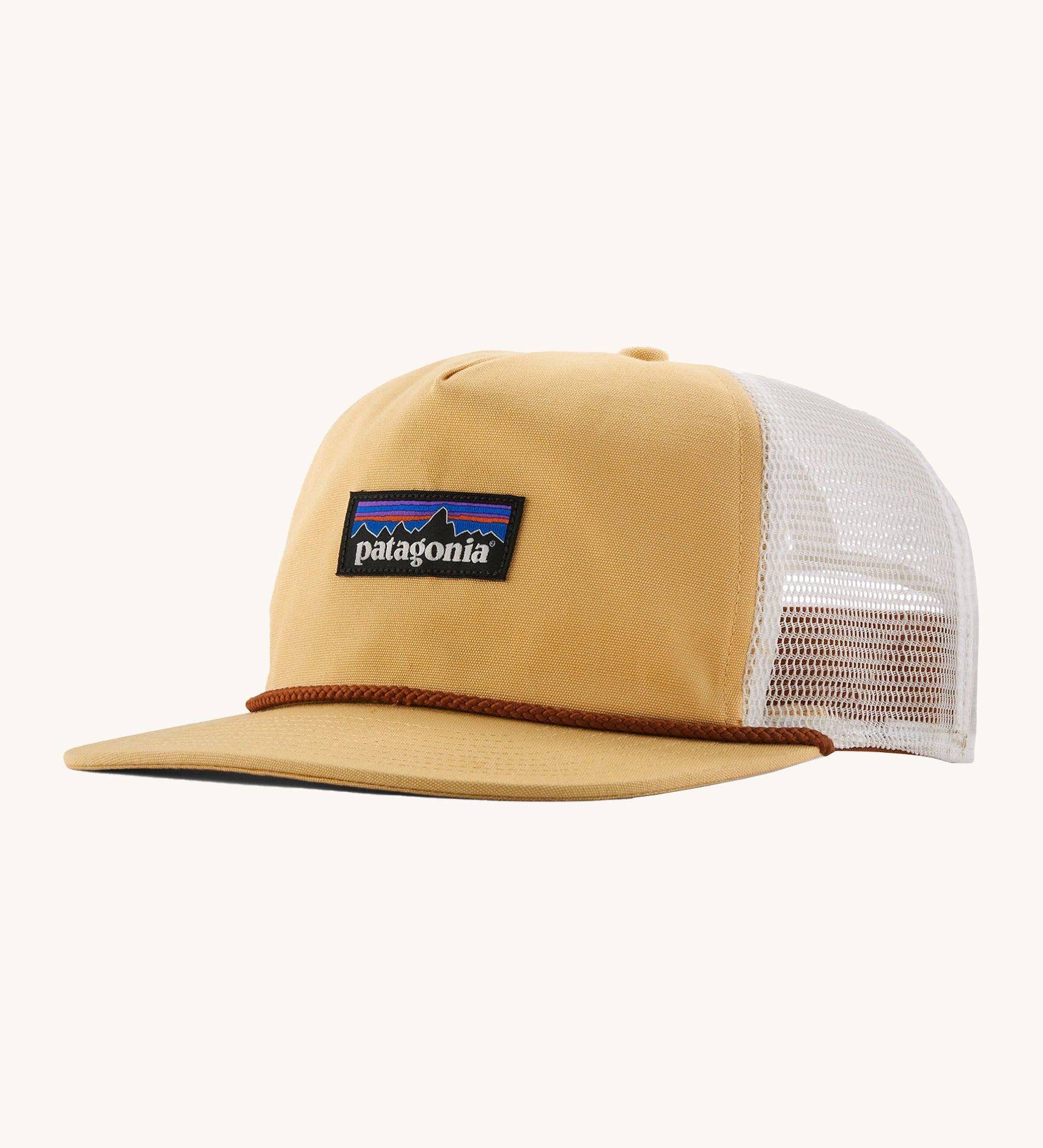Patagonia airfarer cap in a beeswax colour on a cream background