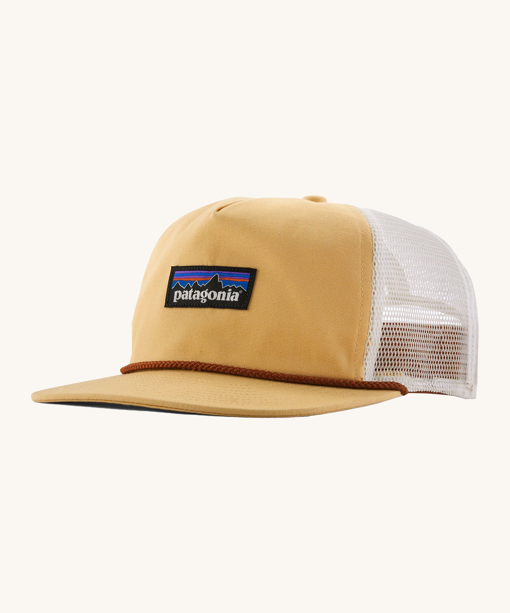 Patagonia airfarer cap in a beeswax colour on a cream background