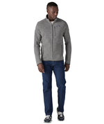A man standing wearing the Patagonia thermal fleece Better Sweater Jacket in stonewash