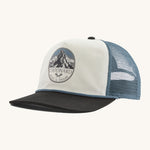 Patagonia airfarer cap in a birch white colour and Chouinard crest design on a cream background.