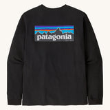 Rear view of the Patagonia Adult  L/S P-6 Logo Responsibili-Tee. A black long sleeve cotton top showing the big brand logo patch printed on the top .