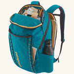 Patagonia 32L black hole backpack  opened with contents inside