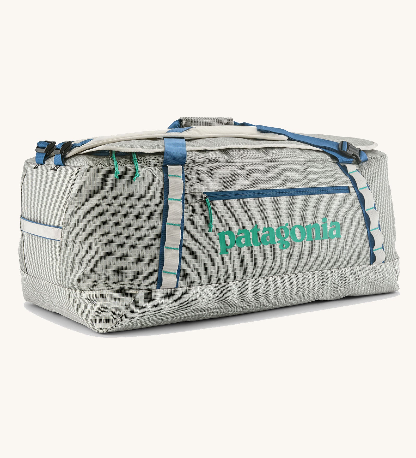 Patagonia black hole 70l duffel bag in birch white with blue zip details and mint green printed logo. 