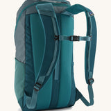 The back of the Patagonia Black Hole Backpack 25L, in a Tidal Teal blue colour palette. 