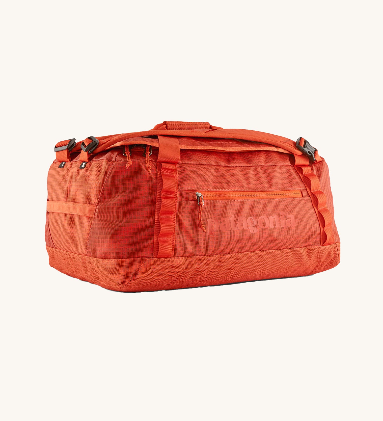 The Patagonia Black Hole Duffel 40L in Pollinator Orange on a plain background.