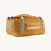 The Patagonia Black Hole Duffel 40L in Pufferfish Gold on a plain background. 