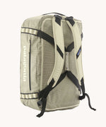 Back of Patagonia black hole duffel 55 litre bag in weathered stone with padded straps.