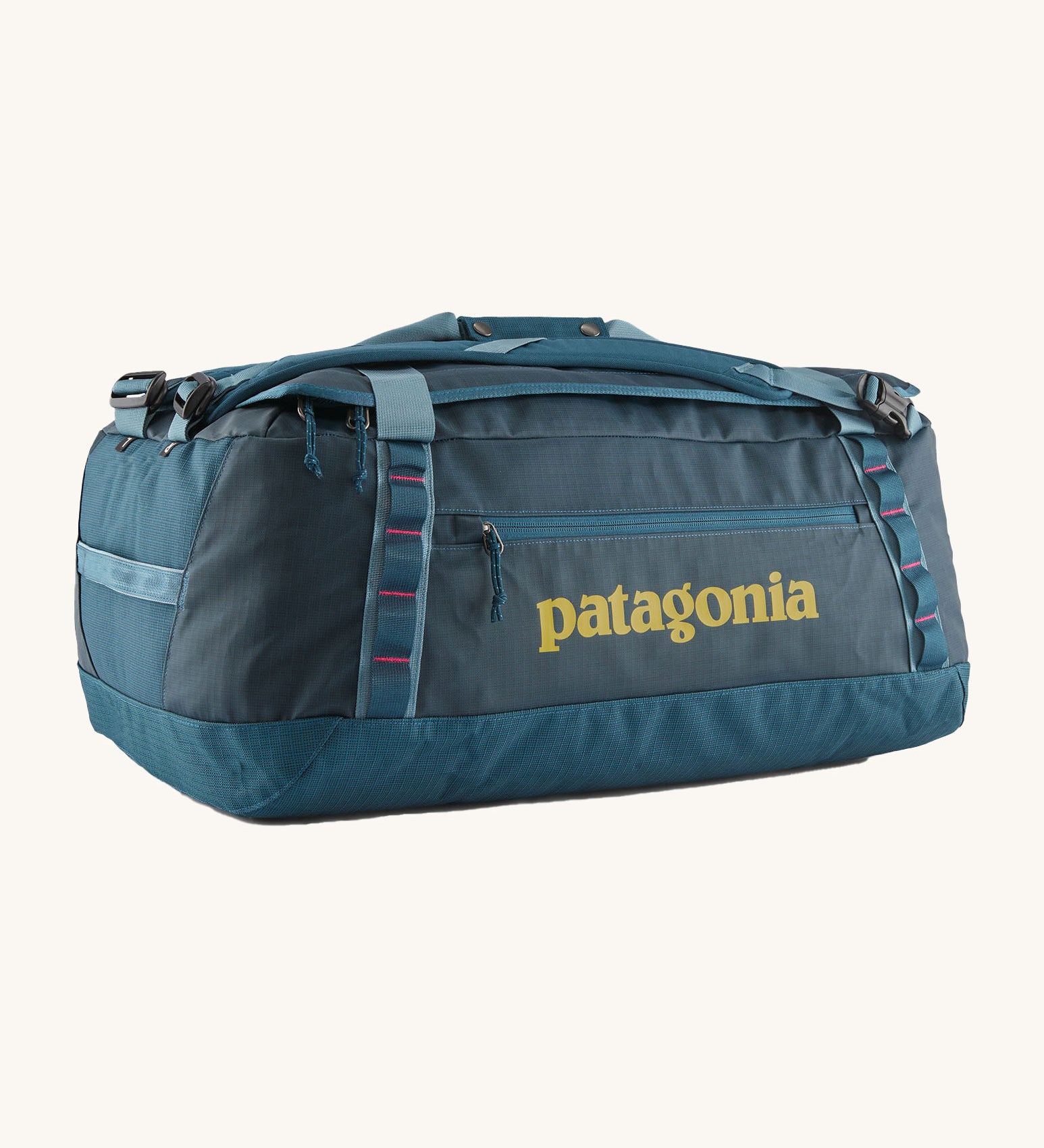 The Patagonia Black Hole Duffel Bag 55L in a Tidal Teal colour on a plain background. 