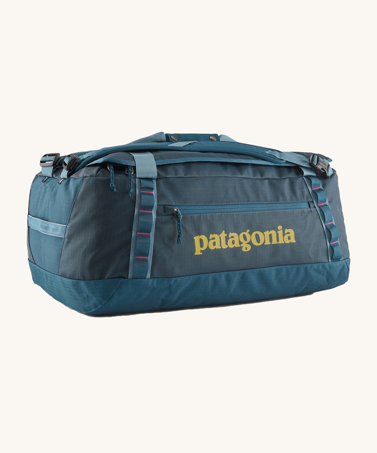 The Patagonia Black Hole Duffel Bag 55L in a Tidal Teal colour on a plain background. 