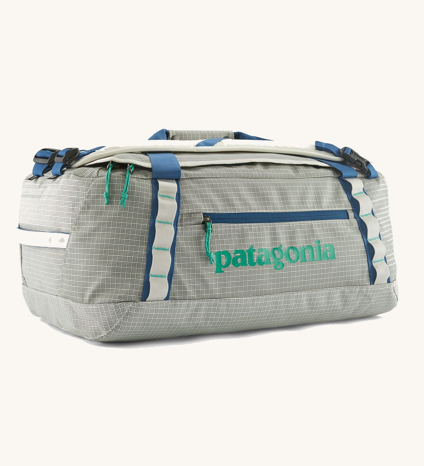 Patagonia black hole 40l duffel bag in birch white with blue zip details and mint green printed logo.