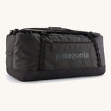 The large 100 litre capacity Patagonia Black Hole Duffel Luggage Bag, in monochrome all black. 