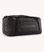 The large 100 litre capacity Patagonia Black Hole Duffel Luggage Bag, in monochrome all black. 