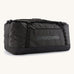 The large 100 litre capacity Patagonia Black Hole Duffel Luggage Bag, in monochrome all black. 