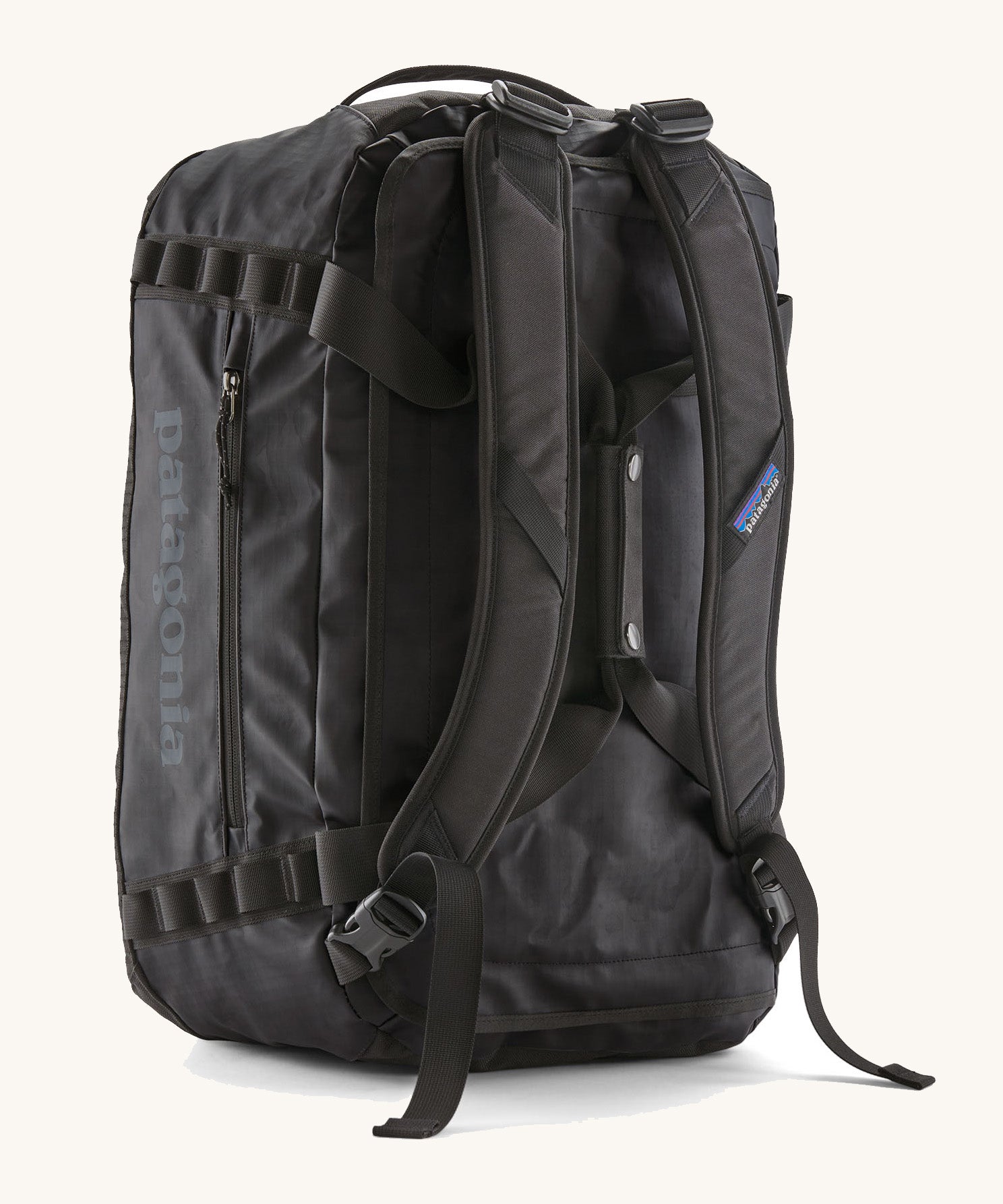 The back of The Patagonia Black Hole 40 Litre Luggage Backpack in monochrome black, showing the shoulder straps.