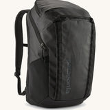 Patagonia Black Hole Pack 32L black front view showing durable water resistant material and large travel backpack storage.