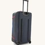 Patagonia black hole wheeled large capacity 100L duffel bag in black with a retractable handle.