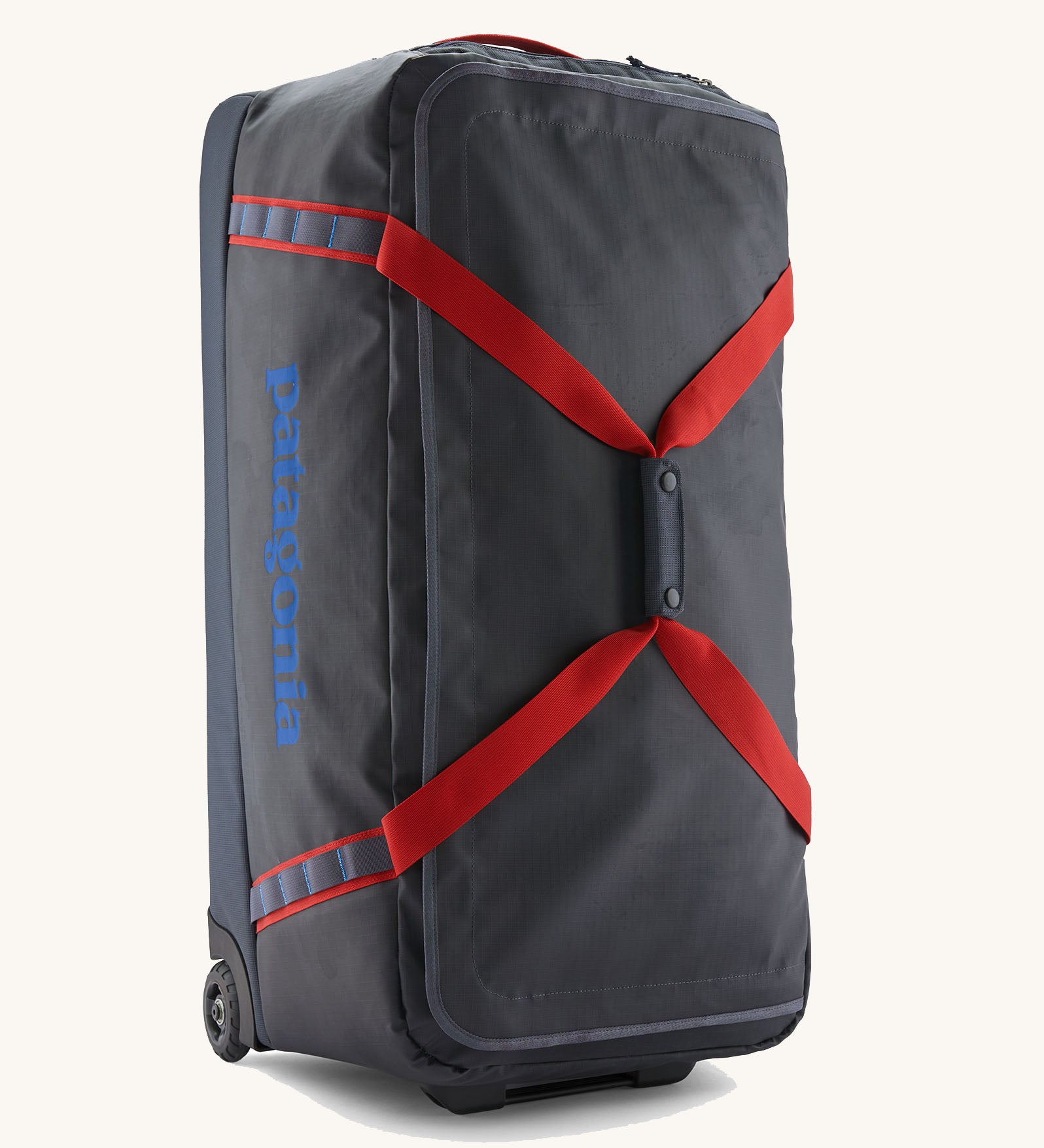 Patagonia black hole wheeled large capacity 100L duffel bag in black with red strap and blue logo on front.