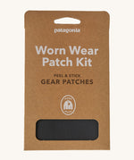 Patagonia worn wear patches in black front packaging detail on a cream background.
