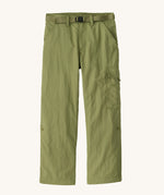 Patagonia kids everyday outdoor pants in a green colour on a cream background.