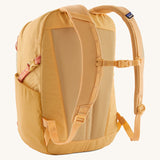 Patagonia yellow 26L day refugio backpack with a buttercup design back detail