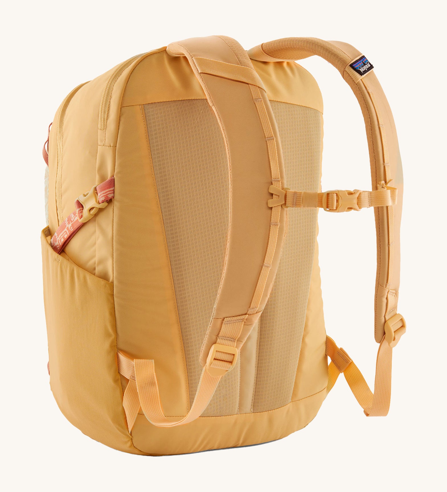 Patagonia yellow 26L day refugio backpack with a buttercup design back detail