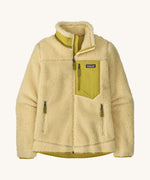 Patagonia women's classic retro fleece jacket in a light yellow colour on a cream background.