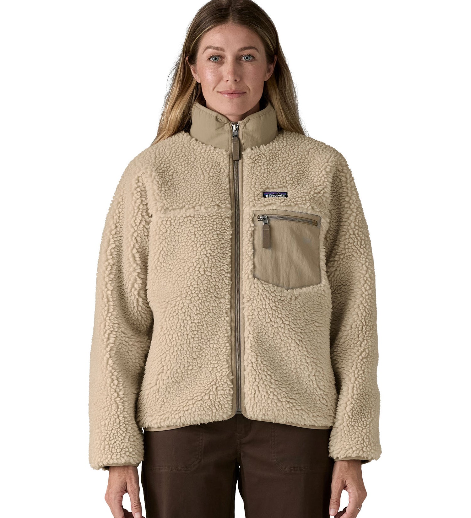 Patagonia classic retro x women's jacket in natural available at Babipur. A thick  warm teddy style fleece in a beige colour. Features a turn up collar, full length zip, 2 side pockets and a easy access chest pocket. 