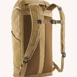 Back view of the Patagonia lid fieldsmith lid backpack in classic tan. Showing the shoulder strap detail and buckle fastening for extra carrying security.