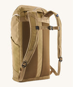 Back view of the Patagonia lid fieldsmith lid backpack in classic tan. Showing the shoulder strap detail and buckle fastening for extra carrying security.