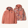 Patagonia Kids Reversible Down Hoody in river river and potters red design side by side showing the different colour and print detail.