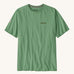 Patagonia mens Fitz roy responsibili top. A green cotton long sleeve t-shirt showing the brand name printed on the left chest and a small badge icon on the right sleeve.