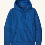 Patagonia men's hoodie in endless blue colour on a cream background.