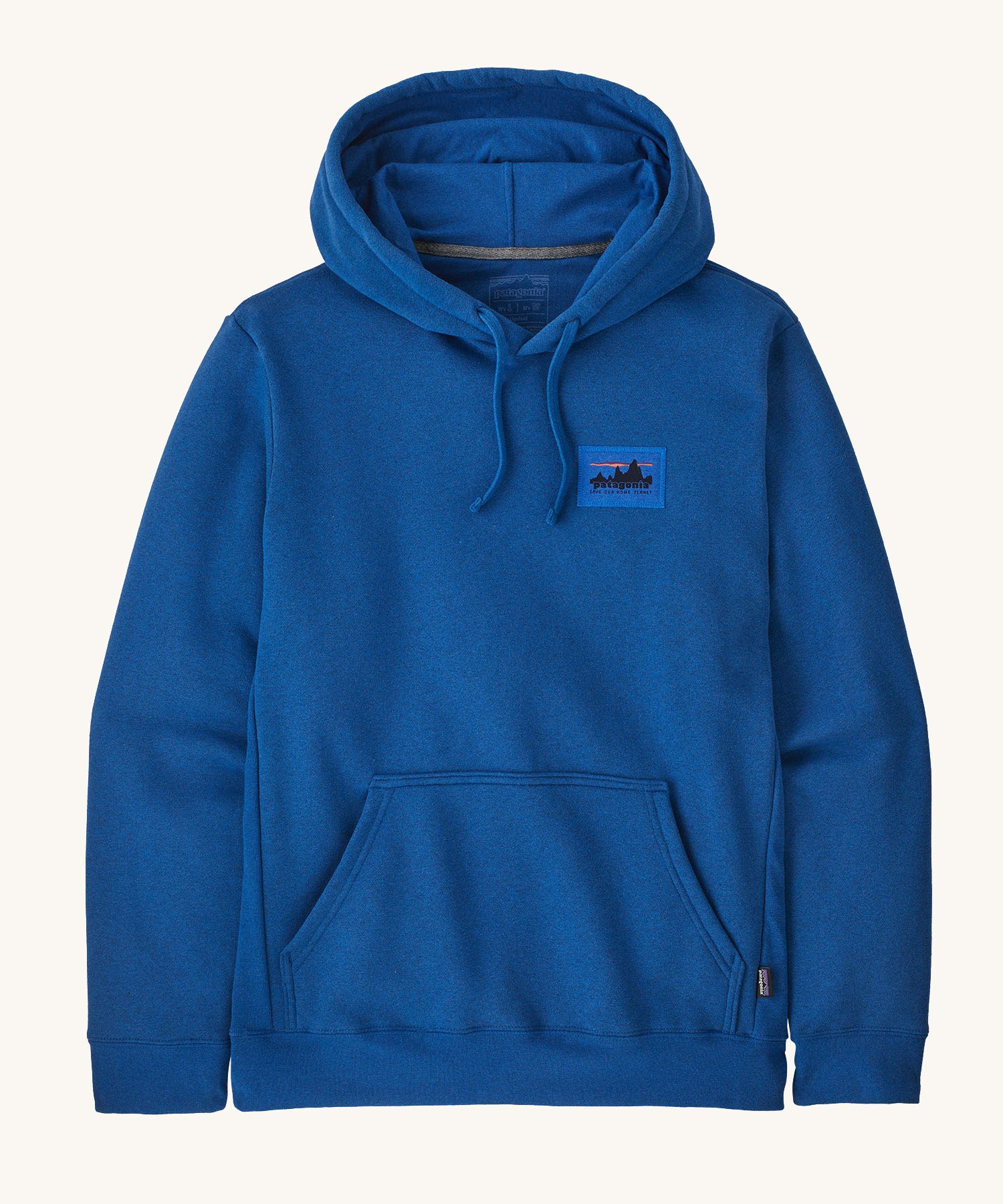 Patagonia men's hoodie in endless blue colour on a cream background.