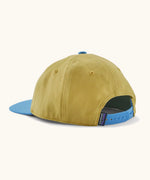 Back of Patagonia kid's funhoggers hat in mustard yellow showing blue size adjustment strap