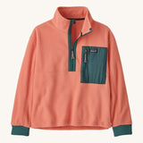 Patagonia kids half zip fleece in light pink colour on a cream background.