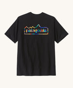 Rear view of the Patagonia Fitz roy ink black unity responsibili top. Showing the large brand logo coloured in with block colours.