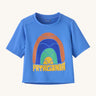 Patagonia kids blue short sleeve t-short rainbow design on a cream background.