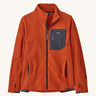 Patagonia air full zip jacket in a dark orange colour on a cream background.
