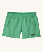 Patagonia Kids Quickdry 4" Unlined Baggies Shorts in an aloe green colour on a plain background. 