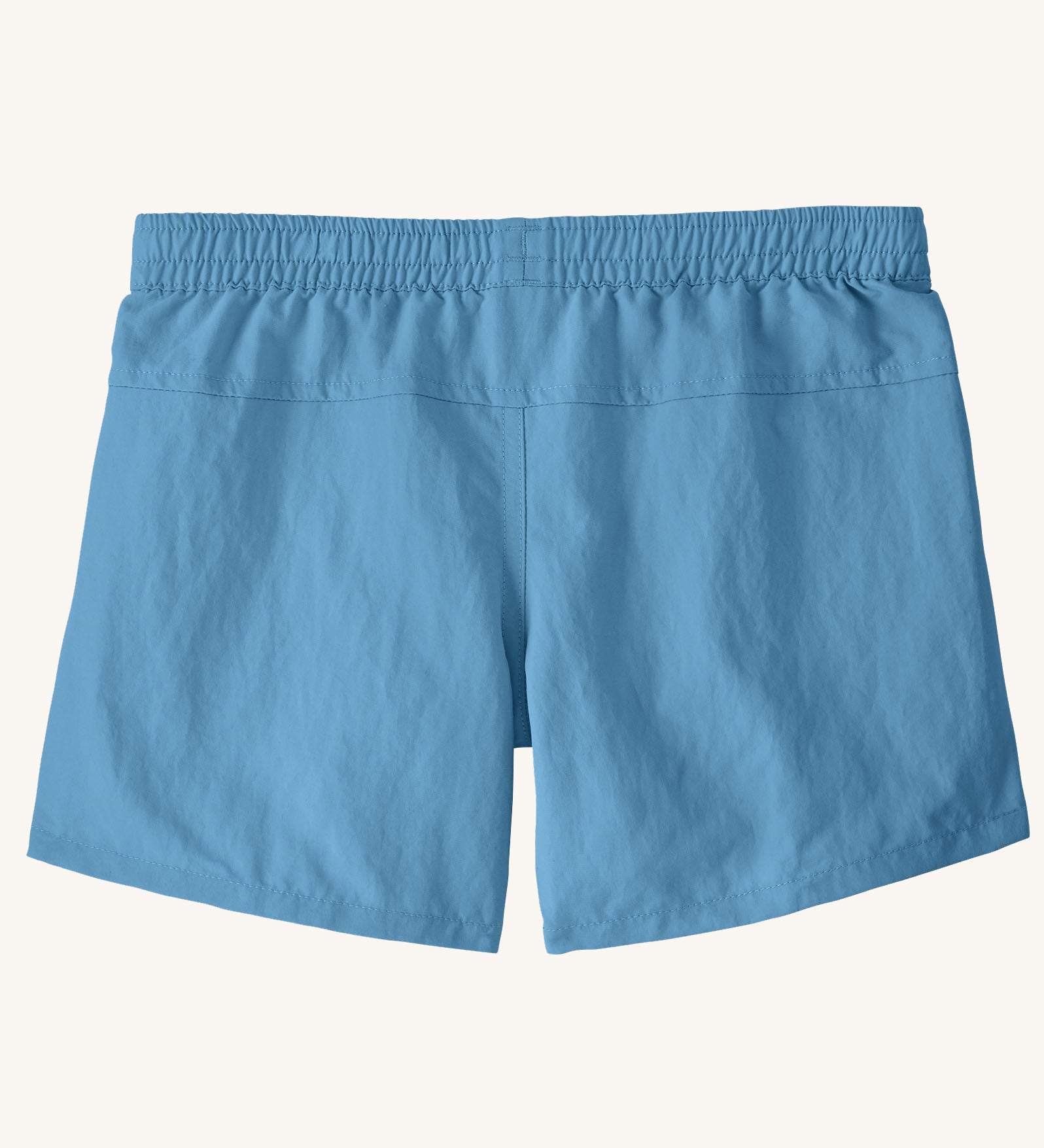 Back of the Patagonia kid's unlined baggies shorts in shore blue with elasticated waistband. 