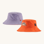 Patagonia kids bucket hat in a pastel purple and orange colour on a cream background.